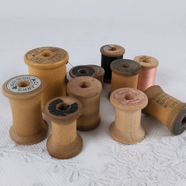 Lot of 12 vintage wooden spools in interesting sizes, rare shapes with manufacturing info carved into the wood or old elaborate label, NO. 1