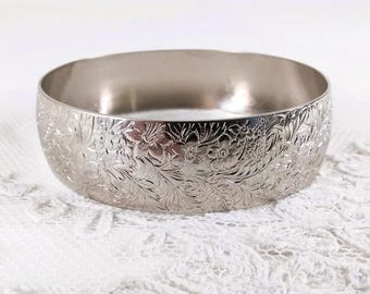 Napier Floral Vintage Bracelet: Silver Filled Bangle with Raised Design