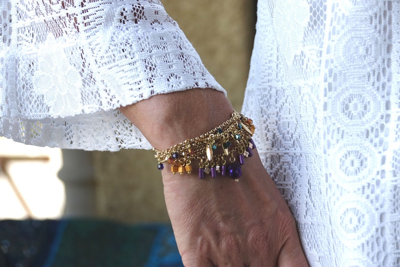 Fine golden multi-strand bracelet, with charms, glass pendants, Buddha head bead, Manoush bracelet image 1
