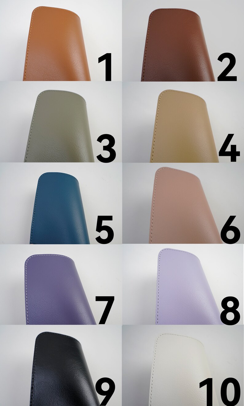 May include: Ten different colored leatherette cases for glasses or other small items. The cases are all the same size and shape, and they are arranged in two rows of five. The colors are brown, red, green, beige, blue, pink, purple, lavender, black, and white.