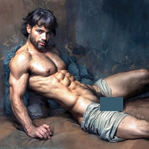 May include: A muscular man with dark hair and a beard lies on a bed with a blue blanket. He is wearing a light brown garment and has a toned physique.