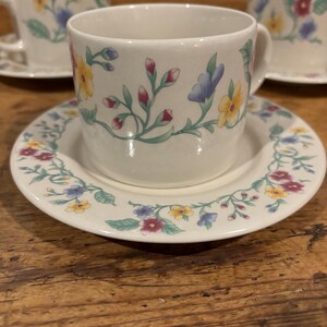 3 vintage Farberware Caprice teacup and saucer sets, featuring a floral pattern