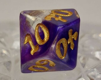 Purple and gold single percentile die