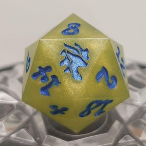 Single D20 yellow and blue handmade resin die