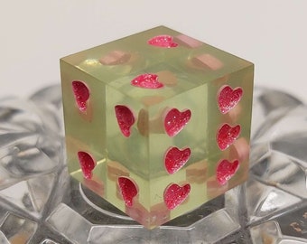 Translucent heart pipped D6 single