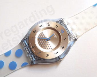 Skin Swatch watch 'Boliblu' 34mm super slim profile, easy-to-read dial, sky blue dots silicone strap, pre-owned good condition, no box