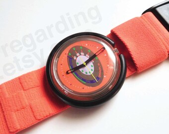 1990s 1992 Pop Swatch watch PWK176 'Paragliding' 39mm, elliptical orbit graphic, bright coral orange, very good gently used condition