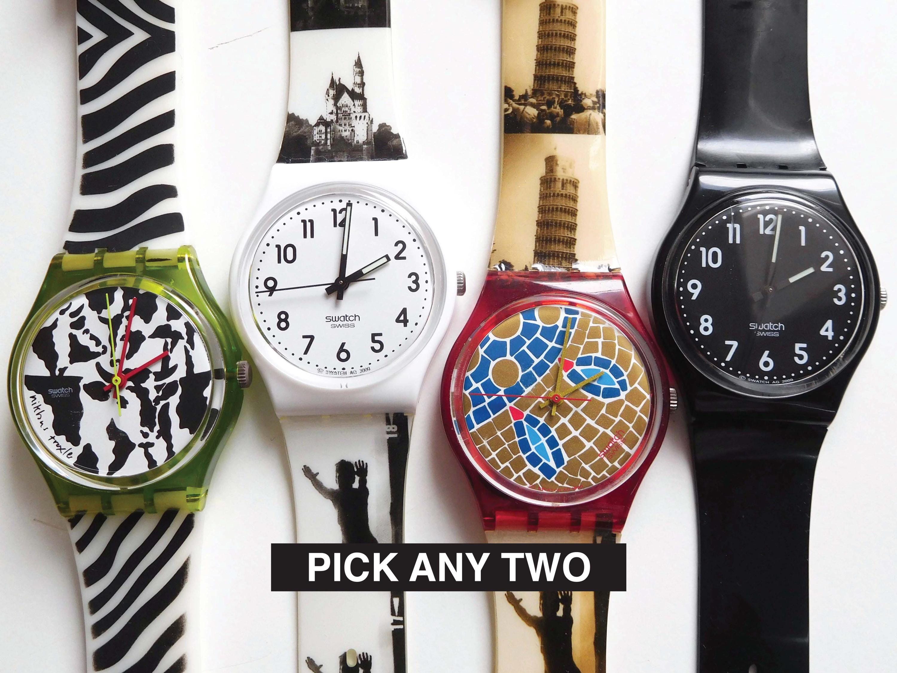 1990s 2000s Swatch watches // pick two // colorful graphics zebra castle mosaic black Colour Codes, 34mm standard, condition varies 1990s 2000s Swatch watches // pick two // colorful graphics zebra castle mosaic black Colour Codes, 34mm standard, condition varies