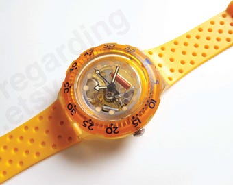 1990s 1991 Swatch watch Scuba SDK104 38mm, skeleton Jelly Bubbles design, orange yellow cheese holes strap, good used condition, no box
