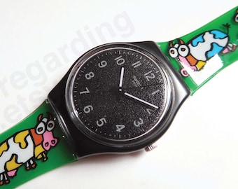 Swatch watch GB326 'Lico-Gum' 34mm, textured black gray classic dial, green cartoon cow strap, good used condition