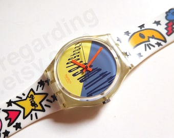 1990s 1991 Swatch watch 'Typesetter' GK131 34mm, wavy numerals typography, good unworn condition, space cartoon strap