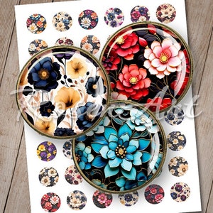 May include: Three round, decorative, glass cabochons with floral designs. The cabochons are set in gold-toned metal frames. The first cabochon features a white background with blue and yellow flowers. The second cabochon features a black background with red and pink flowers. The third cabochon features a black background with blue and gold flowers.