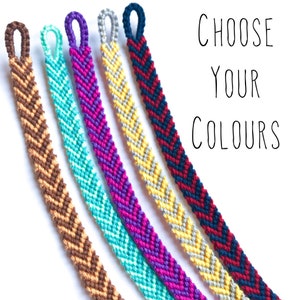 May include: Five friendship bracelets in different colors, including brown, turquoise, purple, yellow, and navy blue. The bracelets are woven with a chevron pattern and have a loop at the end. The text "CHOOSE YOUR COLOURS" is written in white on a white background.