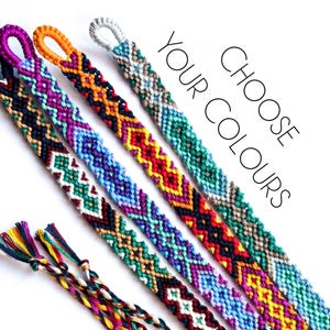 May include: Four colorful friendship bracelets with a chevron pattern. The bracelets are made with embroidery floss and are available in a variety of colors. Choose your colors.