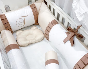 beige crib bumper