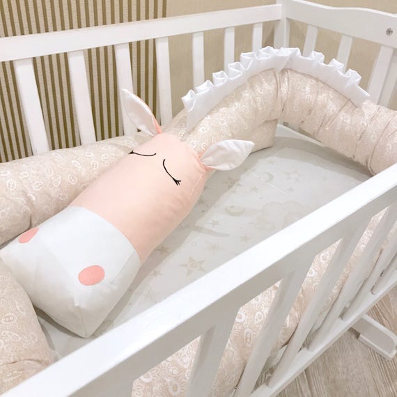 beige crib bumper