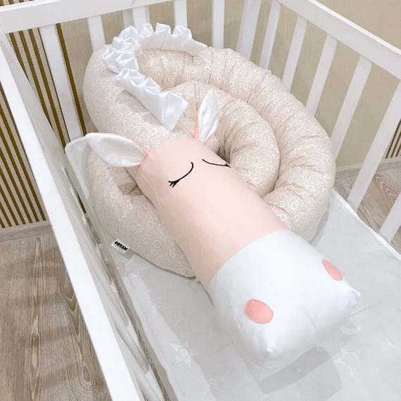 beige crib bumper