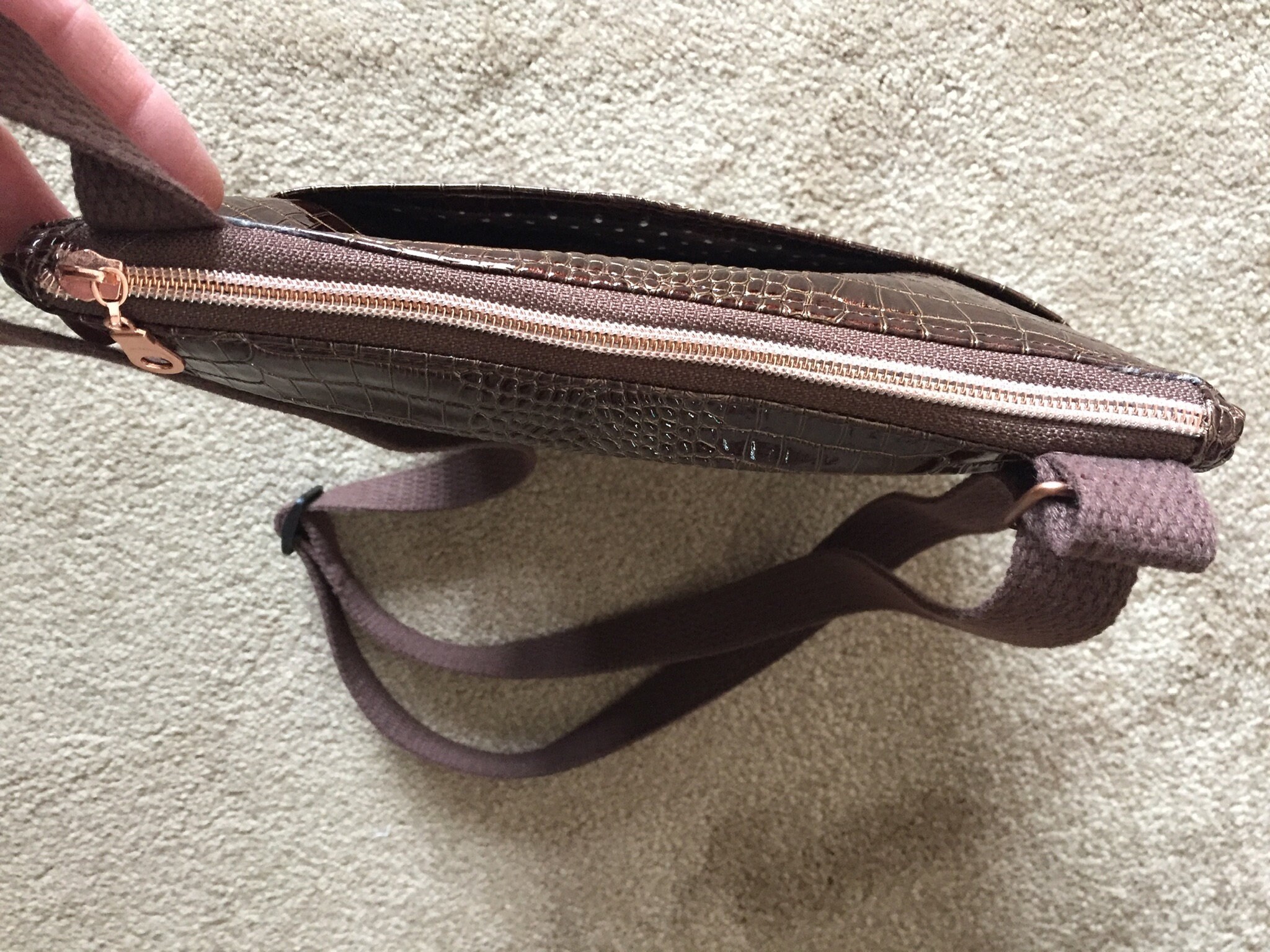 black vinyl crossbody bag