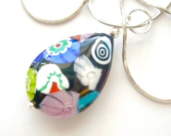 Murano glass pendant with large multi coloured millefiori pear drop with sterling silver chain.