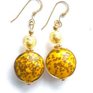 Murano glass earrings with mustard yellow and ginger Murano glass lentil beads with gold filled wires.