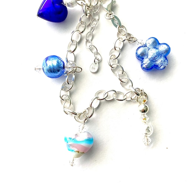 Sterling silver charm bracelet with blue and silver Murano Glass beads and Swarovski crystal.