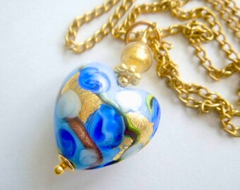 Murano Glass pendant with blue and gold Murano Glass heart and gold chain.