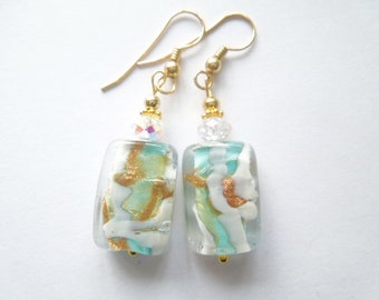 Murano glass earrings with green and gold Murano oblong beads Swarovski crystal and gold fill wires.