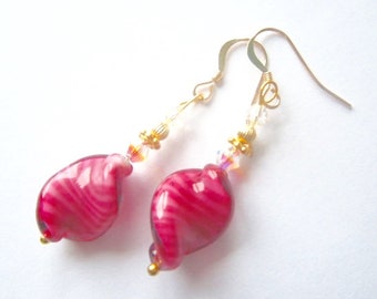 Murano glass earrings with pink elica twist beads Swarovski crystal and gold-filled wires.