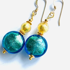 Murano glass earrings with green kingfisher Murano lentil beads with gold filled wires.