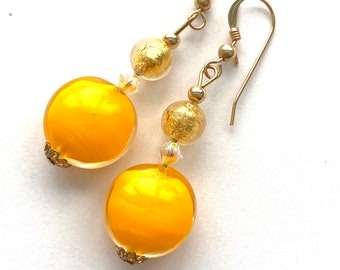 Murano glass earrings with yellow and gold Murano glass beads Swarovski crystal and gold filled wires.