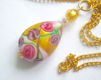 Murano glass pendant with pink and gold Murano large pear drop bead with Swarovski crystal and gold chain.