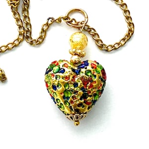 Murano glass pendant with gold rainbow studded heart pendant with Swarovski crystal and gold chain.