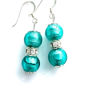 Murano glass earrings with green Murano Glass beads Swarovski crystal and sterling silver.