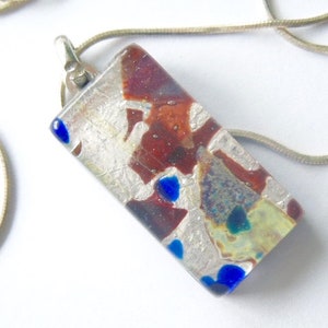 Murano glass pendant with silver Murano glass rectangle and  sterling silver chain.