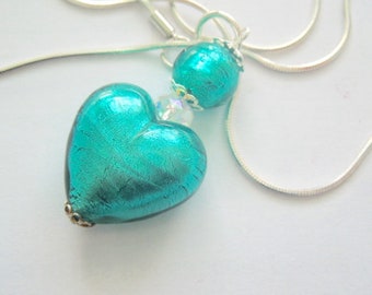 Murano glass pendant with green Murano Glass heart bead Swarovski and sterling silver.