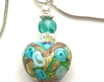 Murano glass pendant with green and Gold Murano glass heart bead Swarovski crystal and sterling silver.
