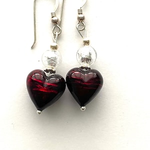 Murano glass earrings with red and silver Murano heart beads with Swarovski crystals and sterling silver.