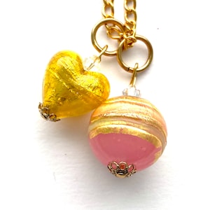 Murano glass pendant with pink and gold Murano glass beads Swarovski crystal and gold chain.