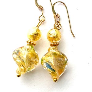Murano glass earrings with gold twist Murano beads Swarovski crystal and gold filled ear wires.