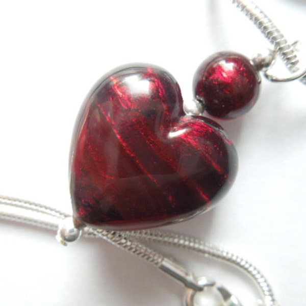 Red Murano glass handmade  heart pendant with sterling silver snake chain.