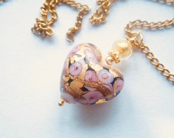 Murano glass pendant with Murano glass heart and gold chain.