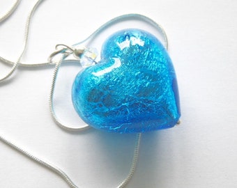 Murano glass pendant with large turquoise Murano glass crackle heart and sterling silver chain.