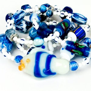 FANCY A SARDINE Vintage Glass Fish Takes Center Stage among Vintage Glass, Ceramic, Stone, and Resin Beads