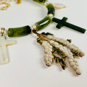 DOUBLE CROSSED Jade-Green Tube Beads and Cultured Pearls Support Crosses and Charms in Stone and Mother of Pearl