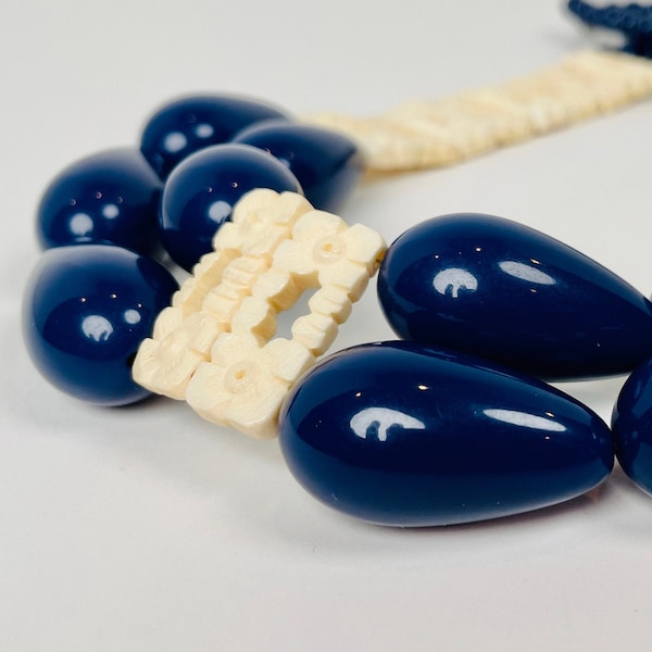 SCRIMSHAW Carved Bone Vintage Bracelet Pieces Line the Neck of This Navy and Cream Necklace