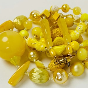 HUNTING YELLOW WINGS Pale Yellow to Citrus Shades Dance on This Long Necklace Made of Vintage Glass, Shell, Resin, and Wood