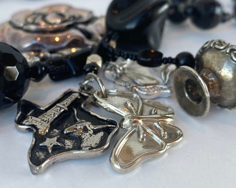 TEXAS ROSE Long Handmade Necklace in a Pullover Style, with Vintage Black and Silver Tone Beads, Pendants, and Charms