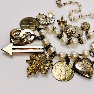 BANJAXED Jacks, Hearts, Leaves, Arrows, and Coins Fall in a Fringe at the Neck of This Choker