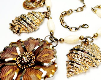 BOMBSHELL Mesh Flower and Spiral Shells with Pale Gold Links and Creamy Beads