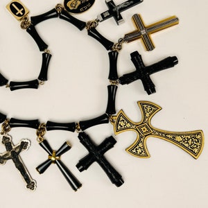SHOCK AND AWE Attention-Getting Damascene Cross Hangs with Other Crosses and Medallions in Black, Silver Tone, and Gold Tone